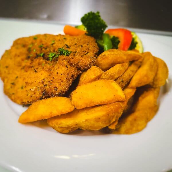 Breaded Chicken with Steamed Veg & Potato Wedges